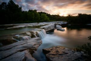 Waterfall in Texas park symbolizes moisture in intimate areas.