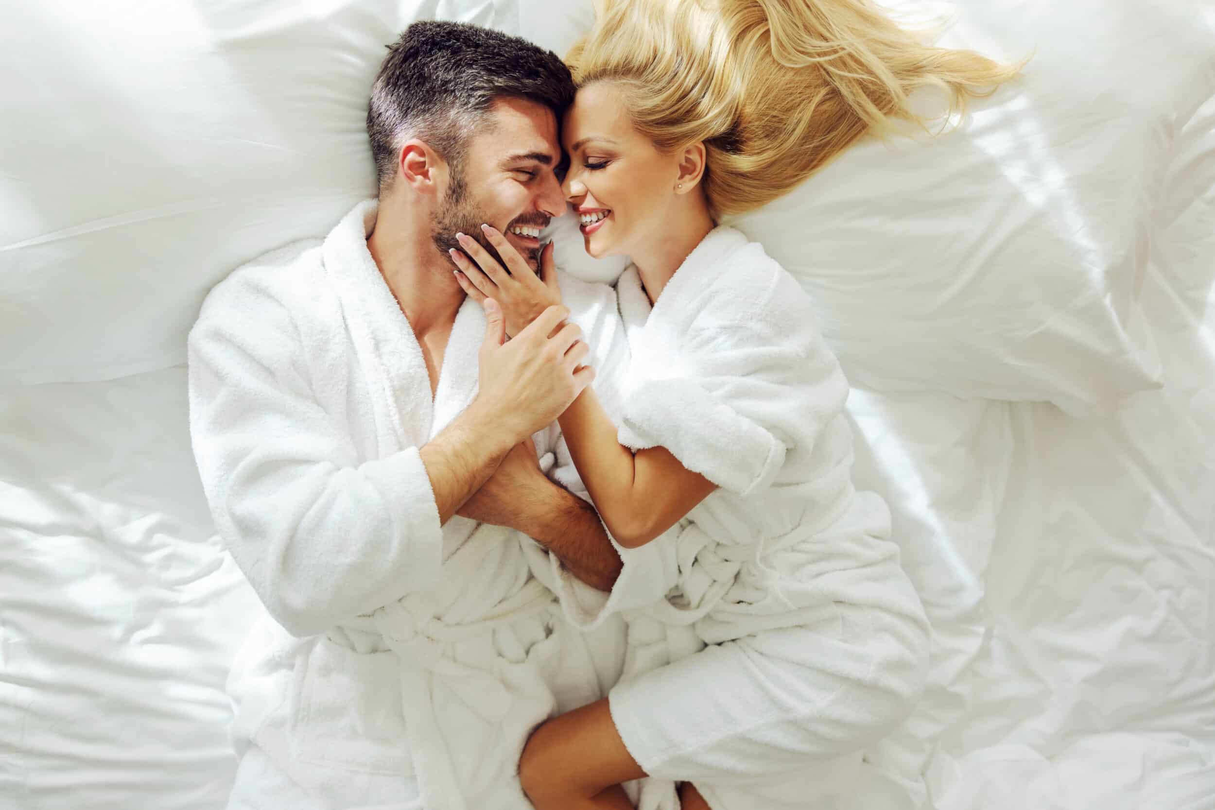 Top,View,Of,A,Middle aged,Couple,In,Love,In,Bathrobes