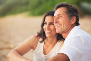 Wealthy husband and his wife enjoy the outdoors.