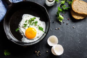 Fried egg in a pan can help increase iron.
